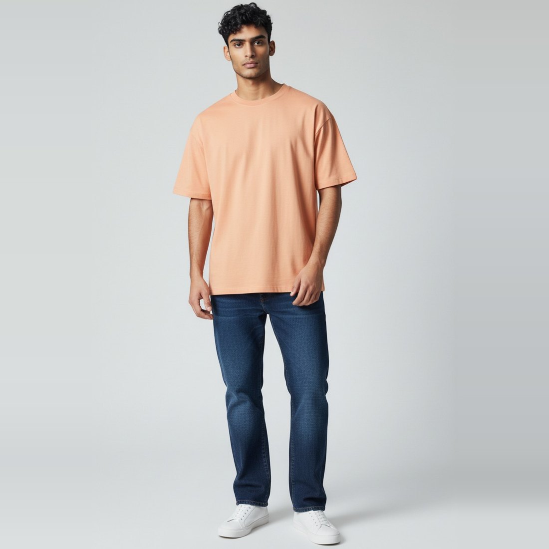 Model wearing peach plain t-shirt, colour code #F4B393 – Bulk Cloth Store